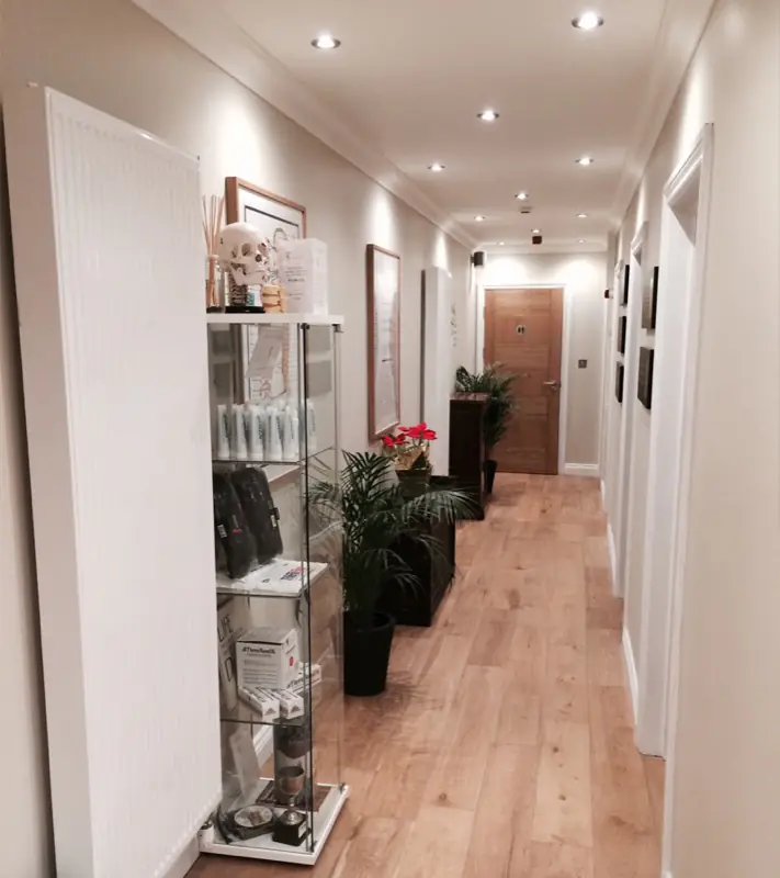 Inside the Billericay clinic: a bright treatment corridor with free parking outside